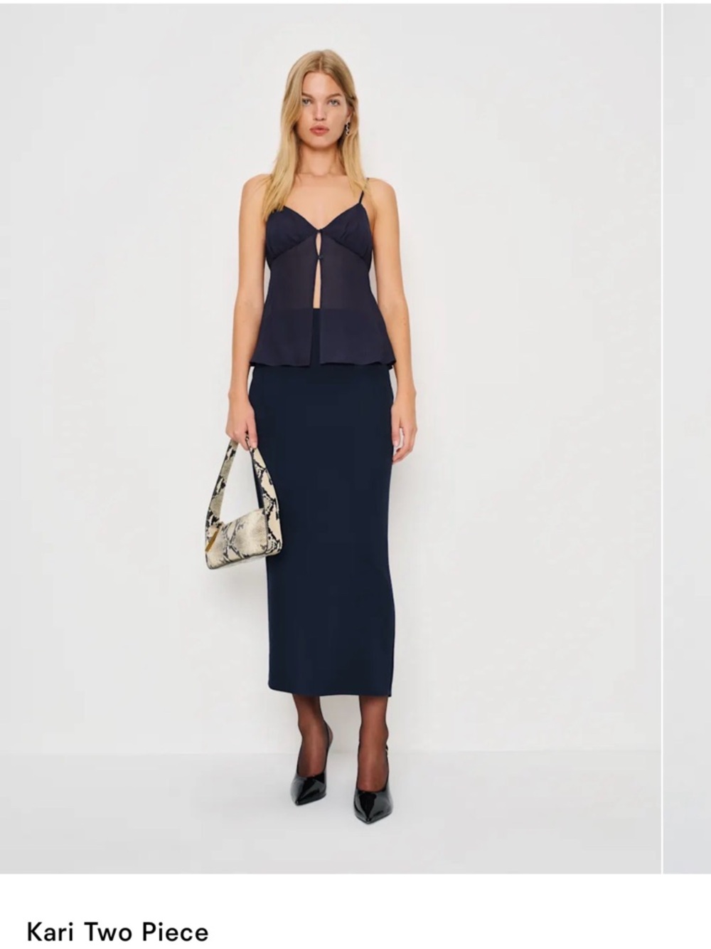 NWT. Size 6. Reformation Navy Midi Skirt